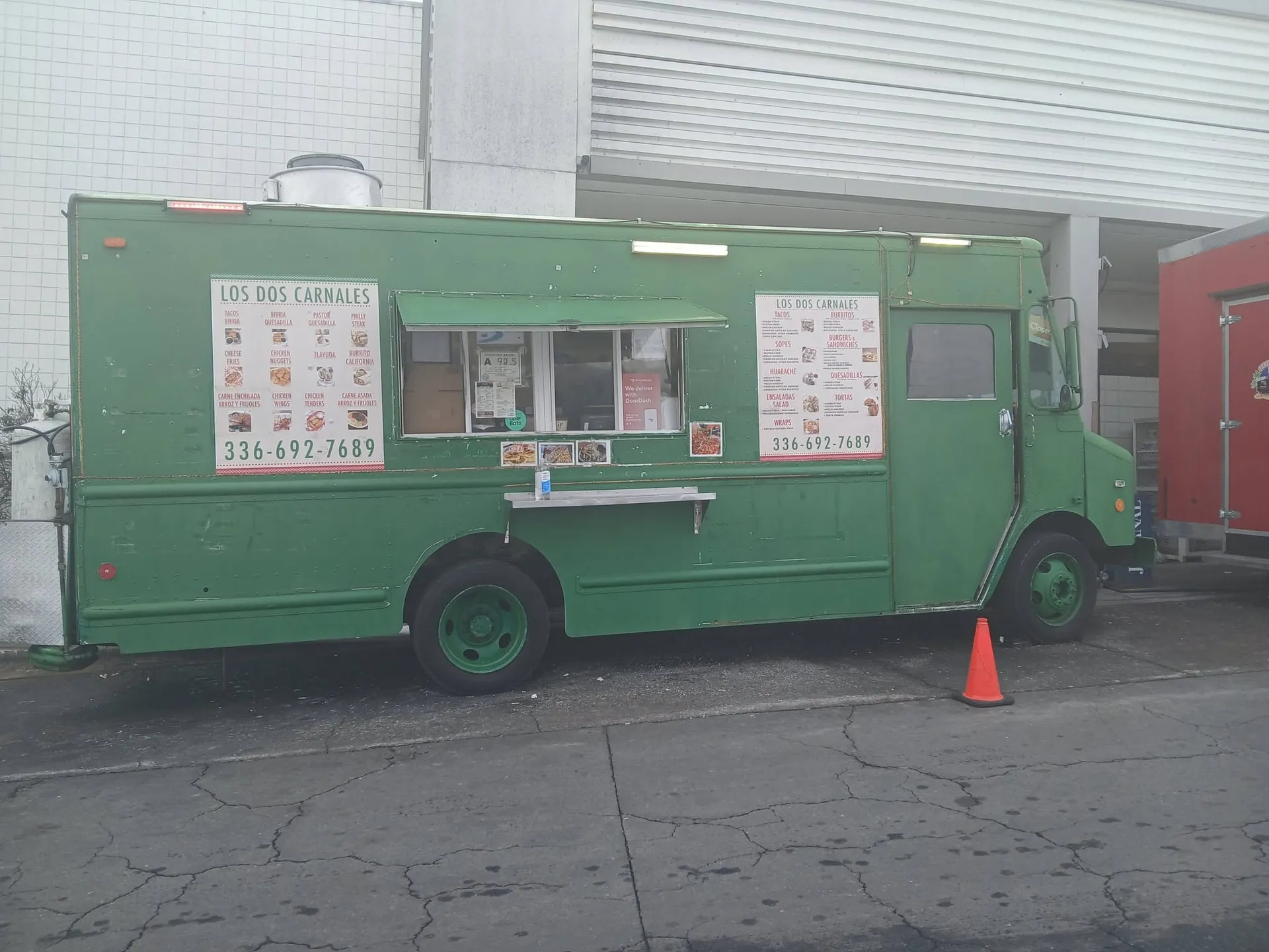 The green Los Dos Carnales truck