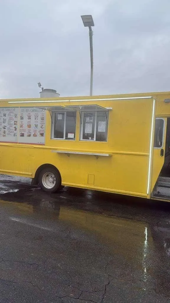 The yellow Los Dos Carnales #2 truck